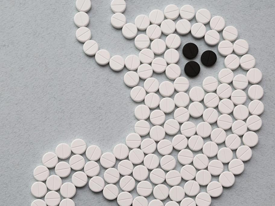 concept of stomach and pills
