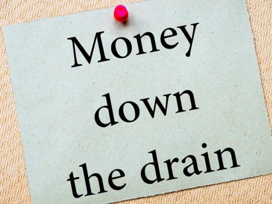 money down the drain sign