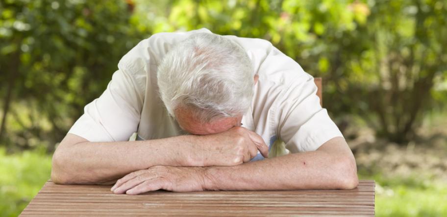 elderly man taking a nap