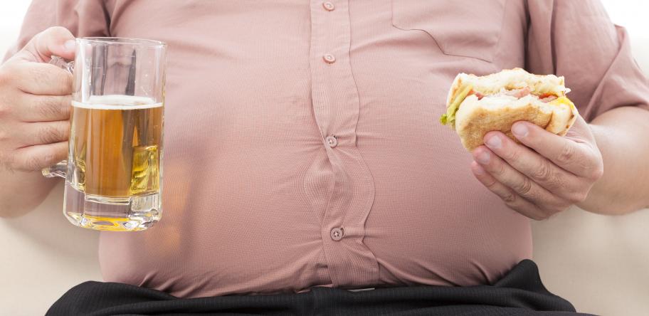Obese man with alcohol