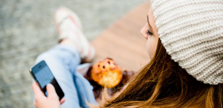 teenager with a muffin