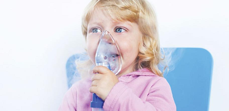 Child in oxygen mask