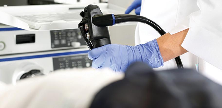 colonoscopy device being held by surgeon